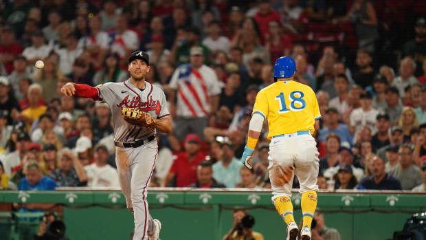 Jul 25, 2023; Boston, Massachusetts, USA; Atlanta Braves first baseman Matt Olson (28) makes the second out of a triple play against the Boston Red Sox in the third inning at Fenway Park.